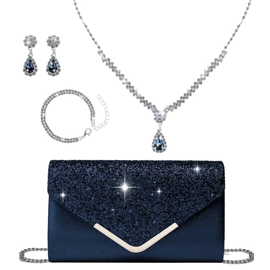 Navy blue clutch bag with sparkling details, necklace, earrings, and bracelet on a beige background