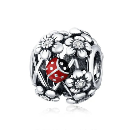Sterling Silver Flower Charm Coco & Dee